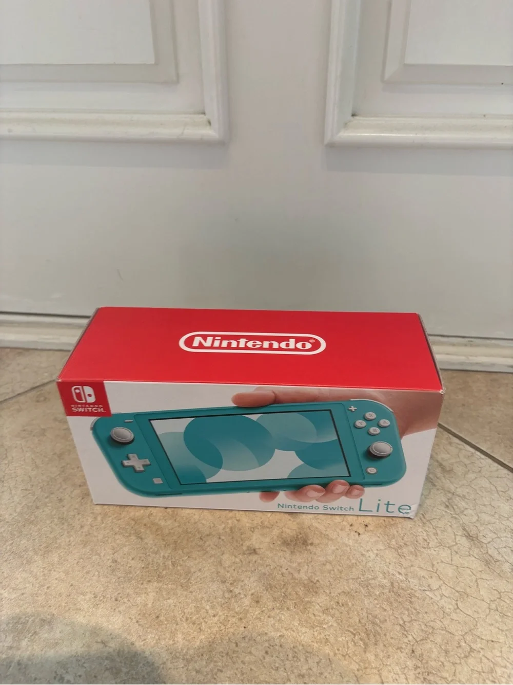 Open Box Nintendo Switch Lite - Turquoise.